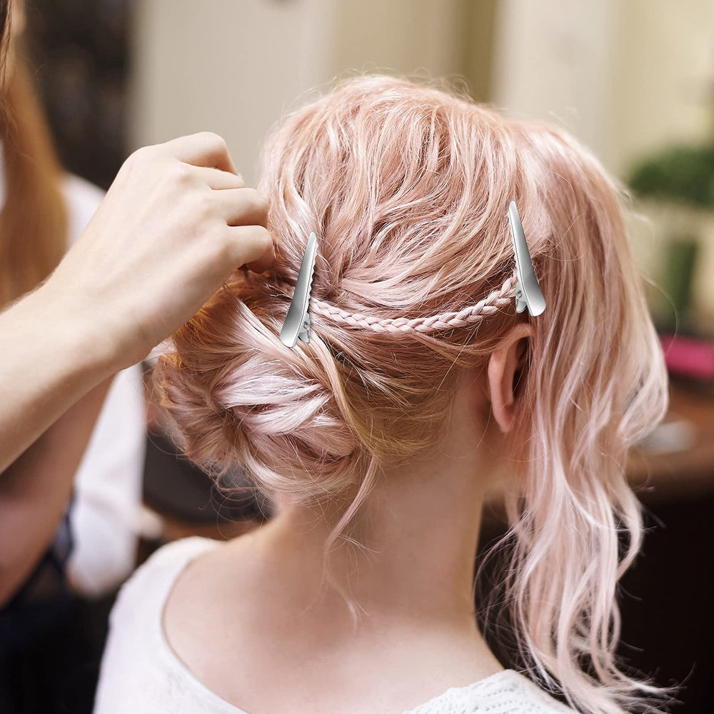 Chuangdi clips used in hair to secure sections, aiding styling precision