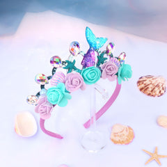 CIEHER mermaid crown on table with balloons, creates festive mermaid vibe