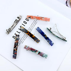 Cinaci gift-ready lifestyle scene presenting barrettes as stylish, ready-to-gift accessory