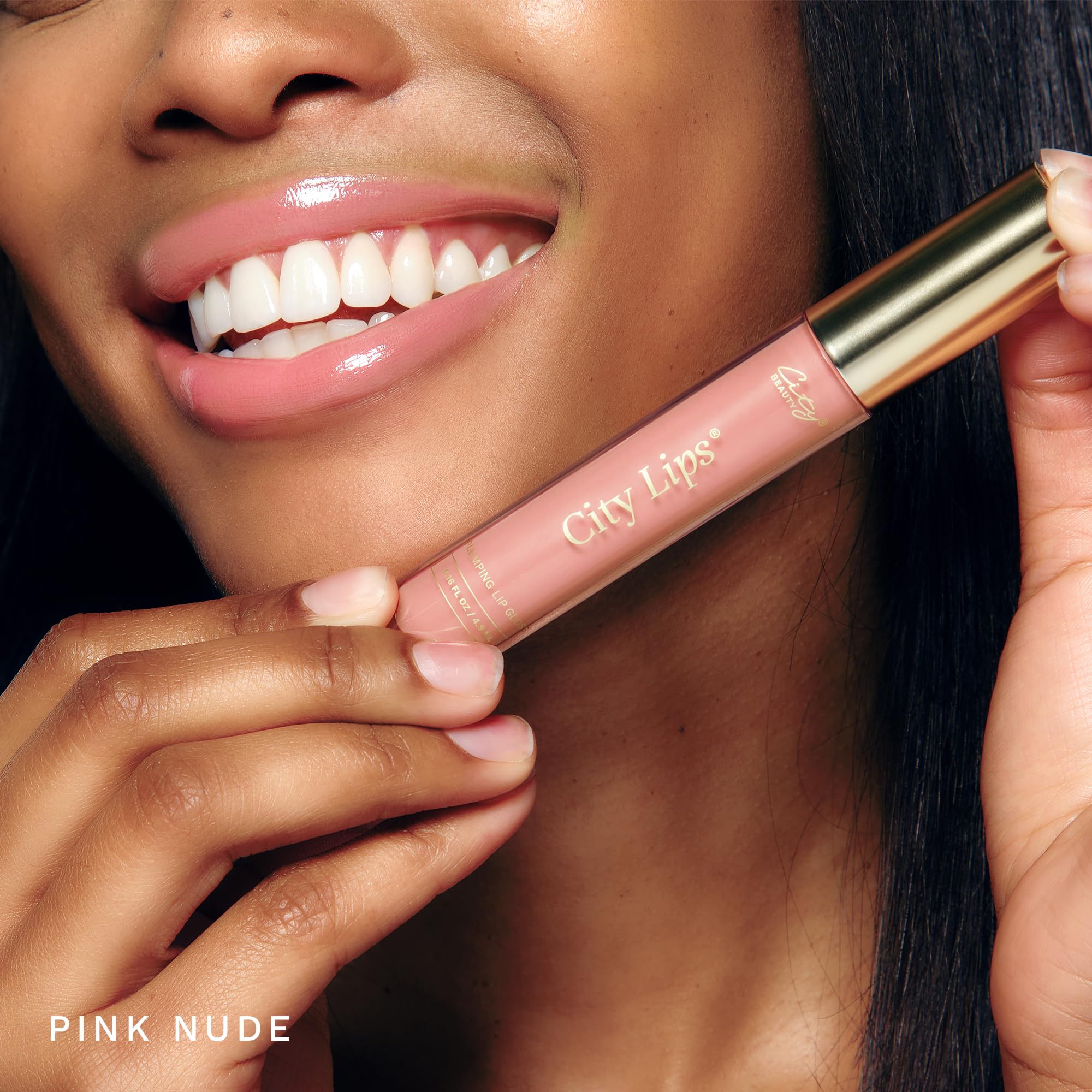 City Beauty City Lips applied on model lips demonstrates visible shine and fuller look