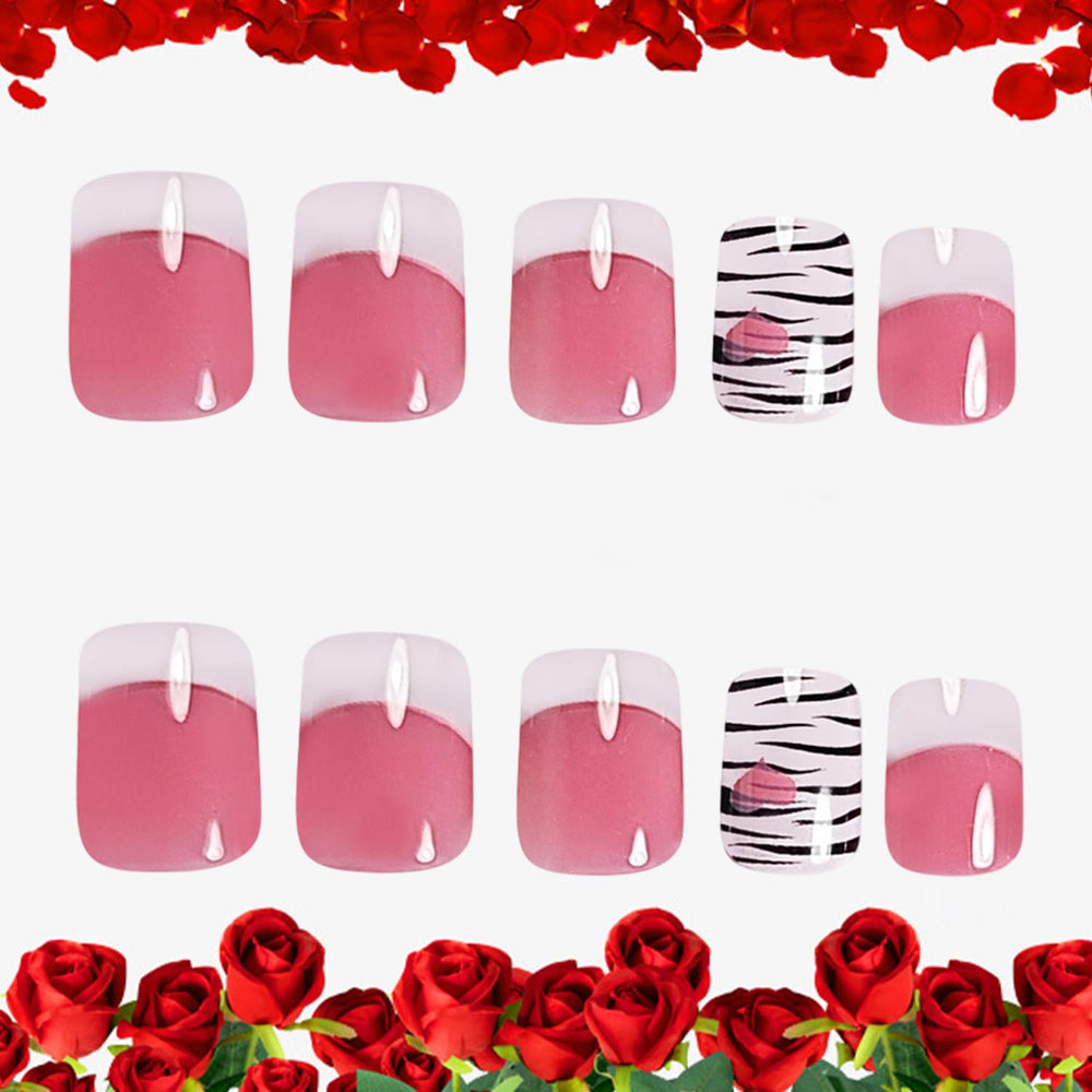 CJDLTS close-up of white French tip with black love line, sharp decorative detail