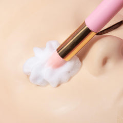 CL CAMILLASH salon scene with stylist using foam cleanser for professional lash maintenance