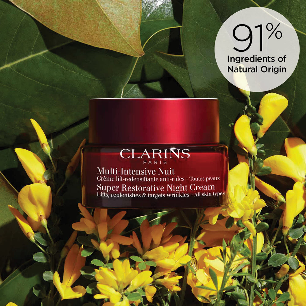 Clarins 1.7 oz jar in hand showing scale and travel-friendly size advantage