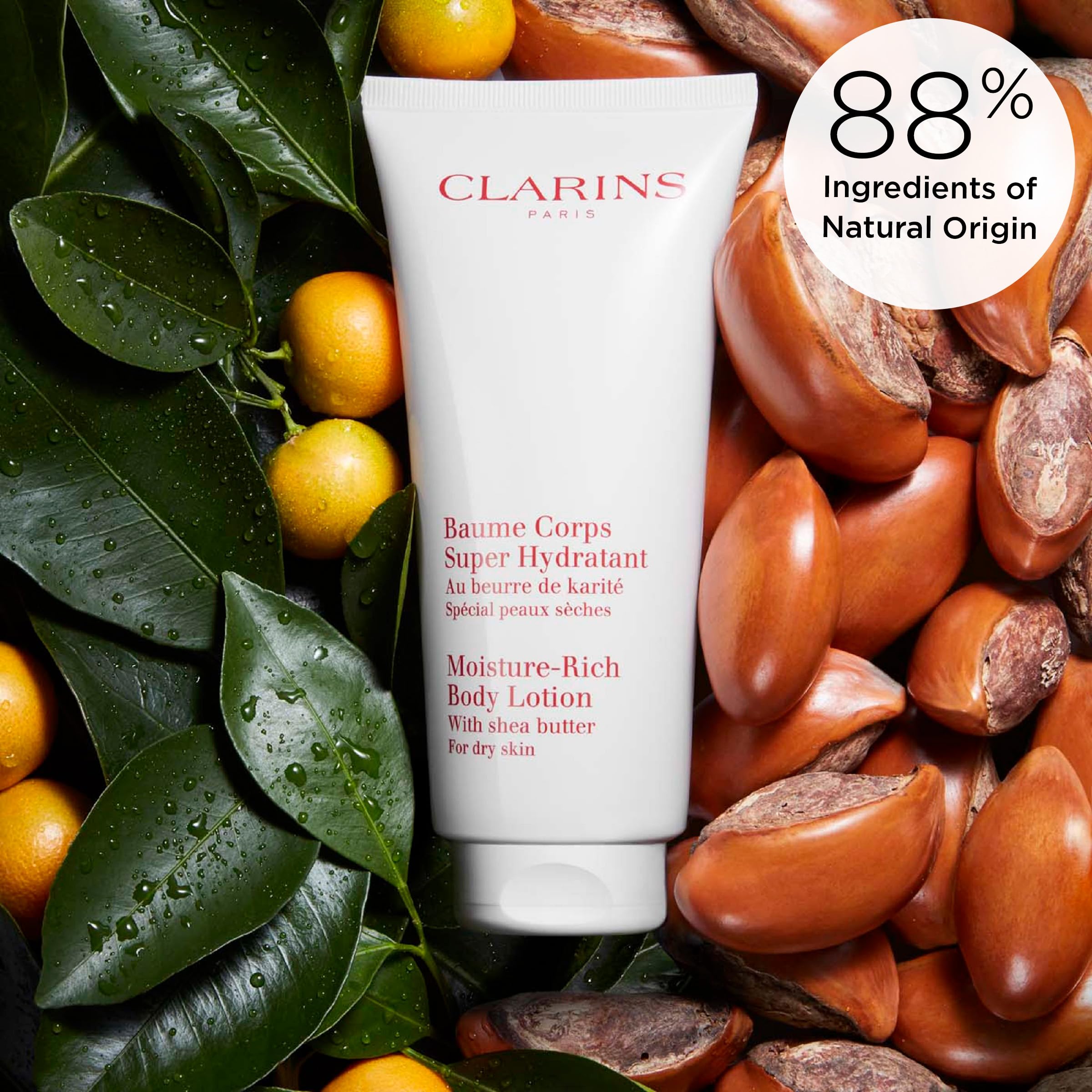 Clarins being applied to forearm showing hydration and visible softening benefit