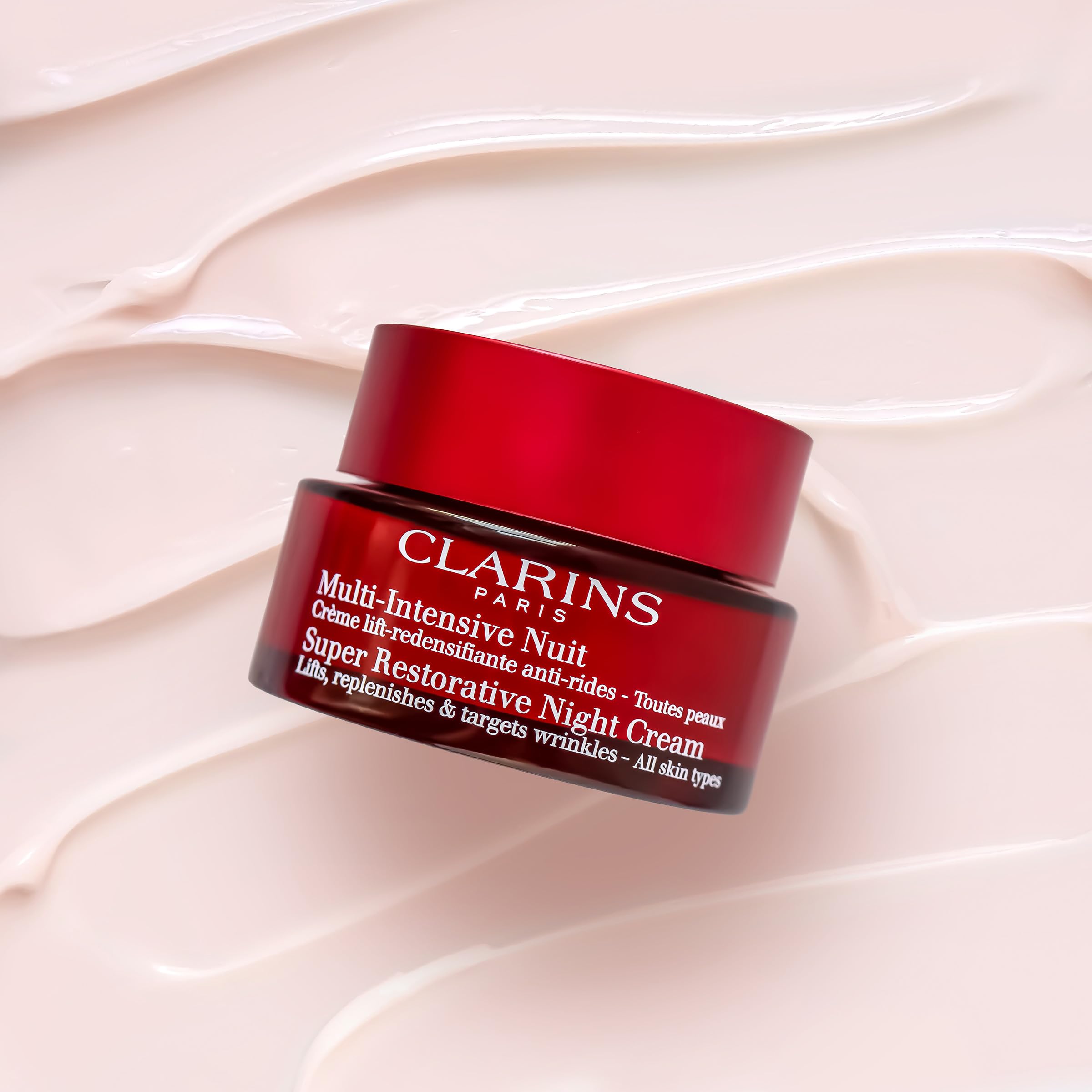 Clarins cream on fingertip ready for application and smooth, easy absorption