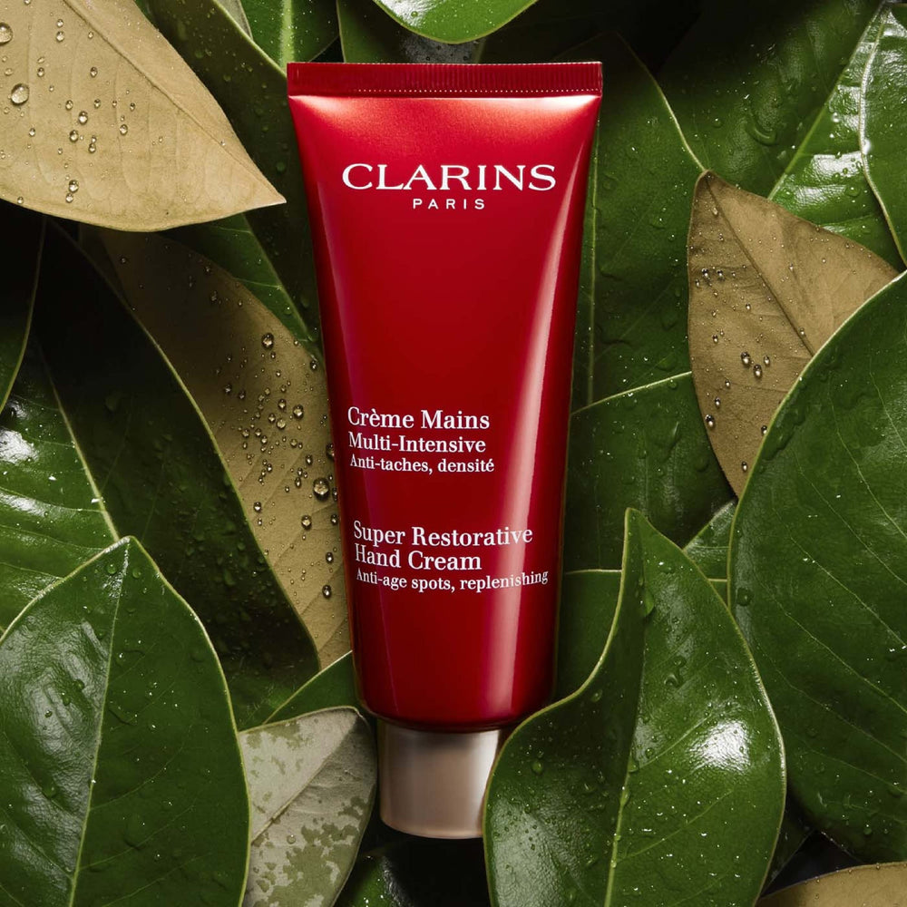 Clarins hand cream applied on mature hands demonstrating visible smoothing