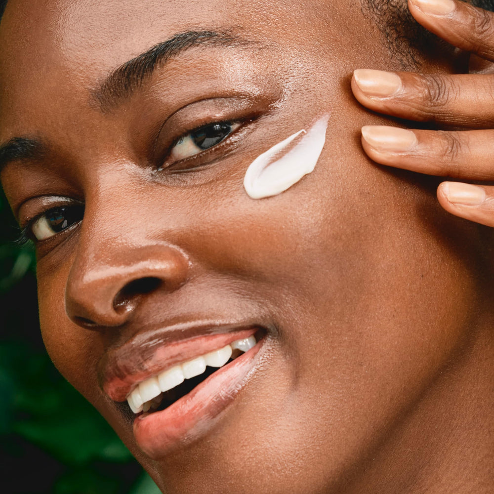 Clarins label close-up showing niacinamide 2% ingredient for tone-refining benefit