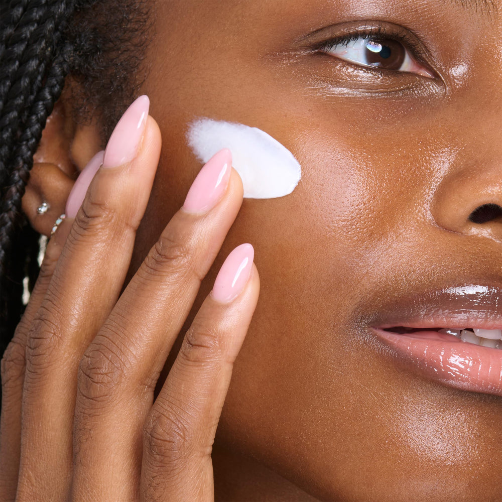 Clarins jar styled on décolleté in a lifestyle scene suggesting daily use and elegance — clarins firms