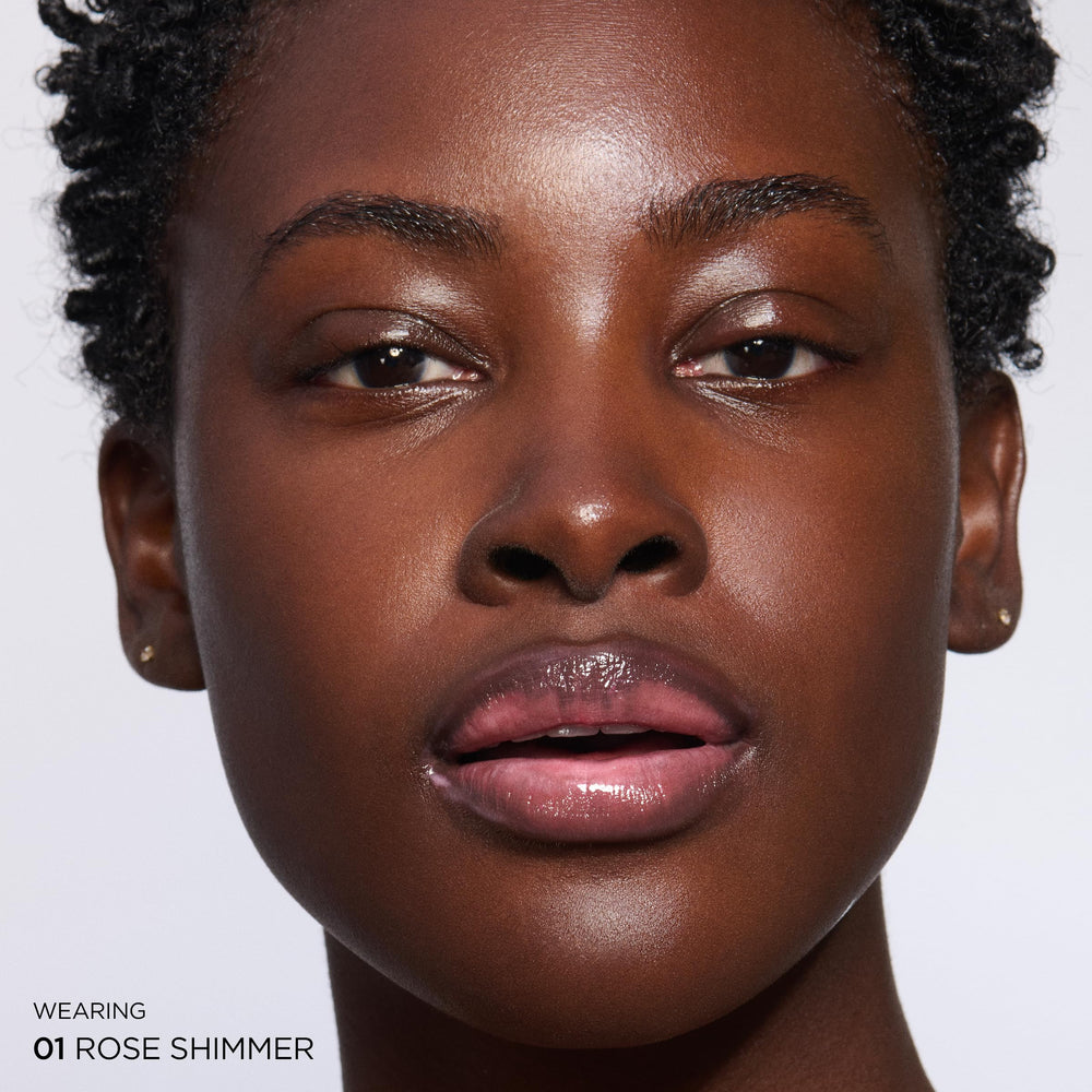 CLARINS product staged with shea and mango butter ingredients illustrating nourishing benefits