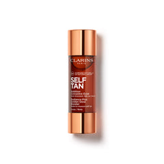 CLARINS bottle front view showing sleek tan booster and brand clarity