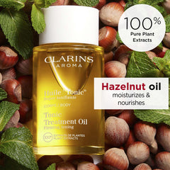 Clarins oil texture droplet on skin demonstrating lightweight absorption and hydration