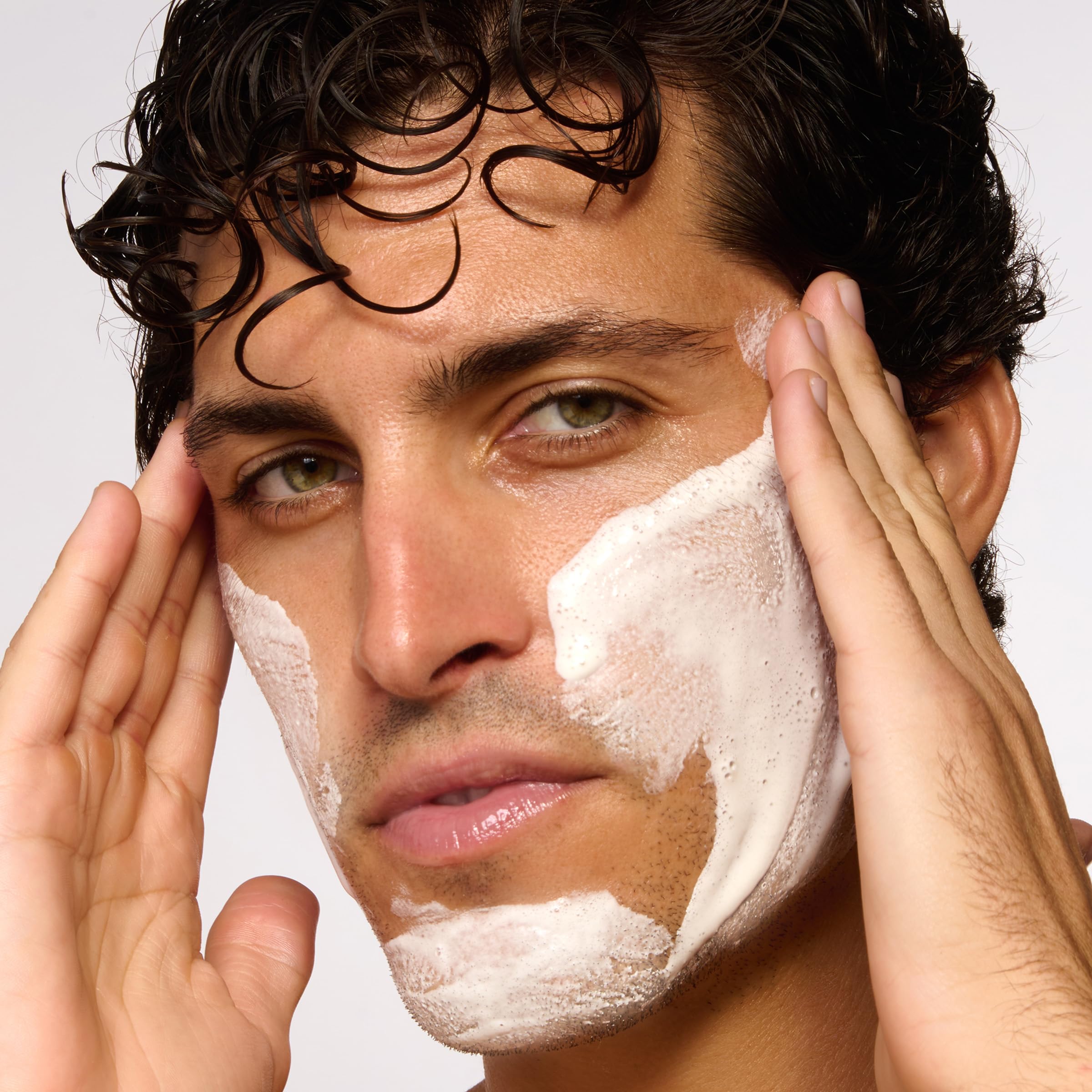 CLARINS men exfoliator cleanser foamy lather in hand, effective cleansing benefit