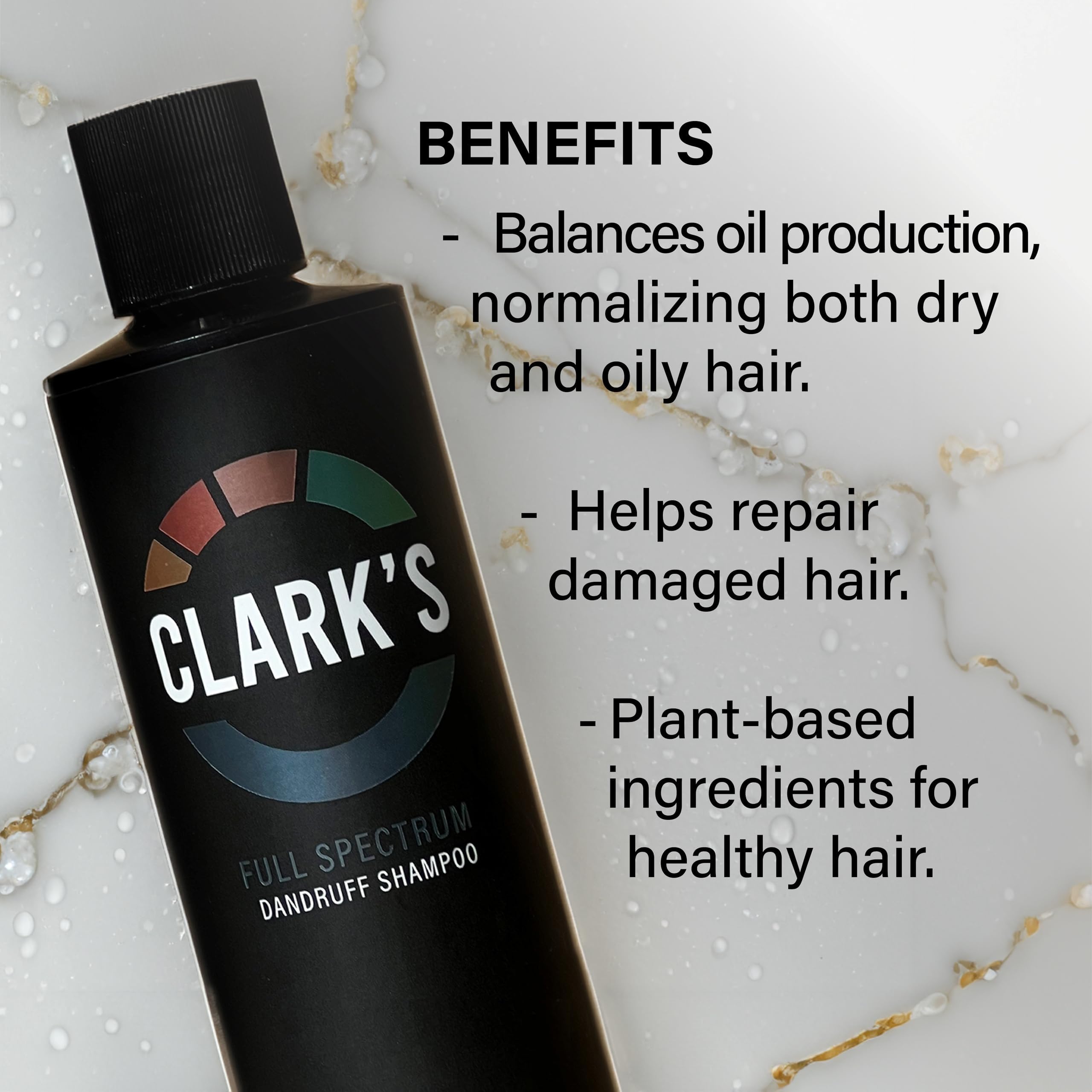 Clark's bottle in hand scale demonstrating compact 8 fl oz convenience