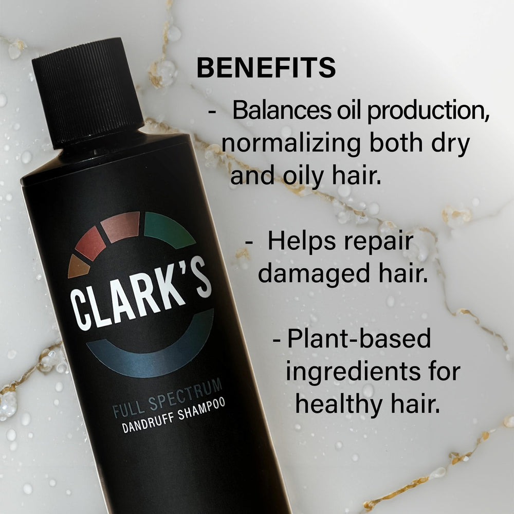 Clark's bottle in hand scale demonstrating compact 8 fl oz convenience