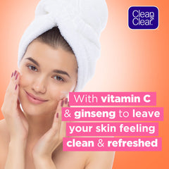 Clean & Clear tangerine extract bottle emphasizing refreshing citrus scent benefit