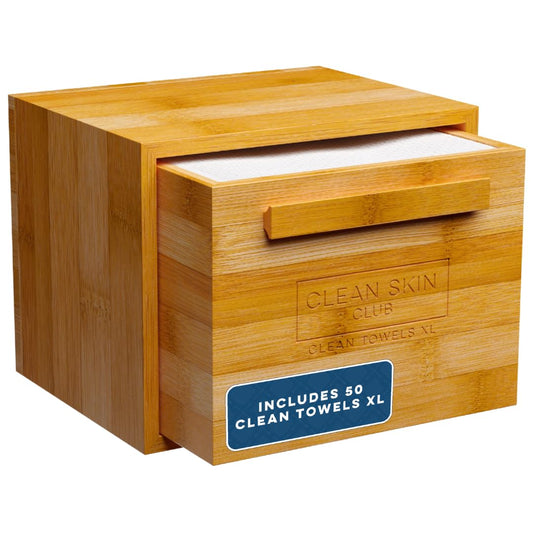 CLEAN SKIN CLUB front packaging on counter showing sleek bamboo dispenser benefit tidy storage