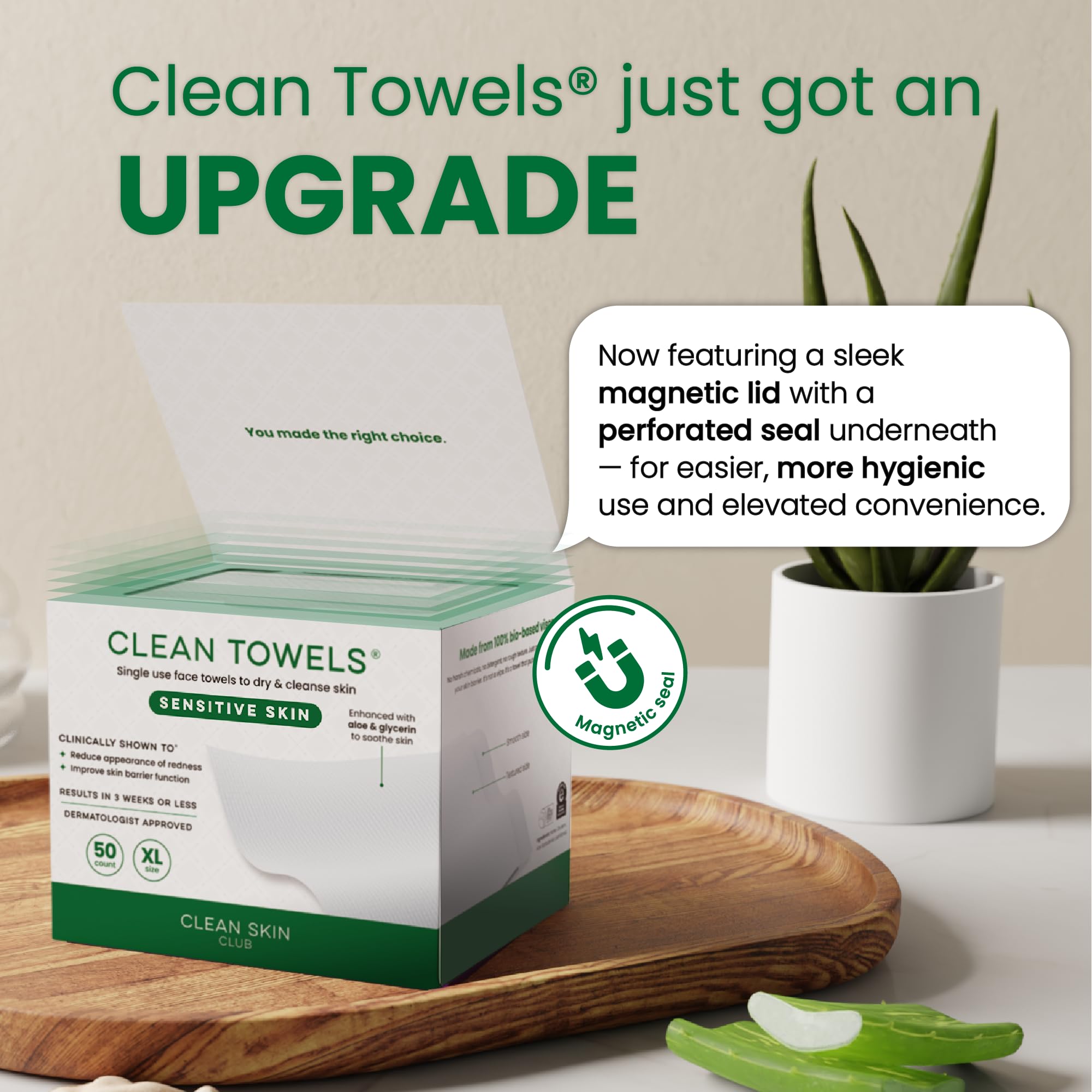 CLEAN SKIN CLUB towel next to a hand for scale to show XL coverage