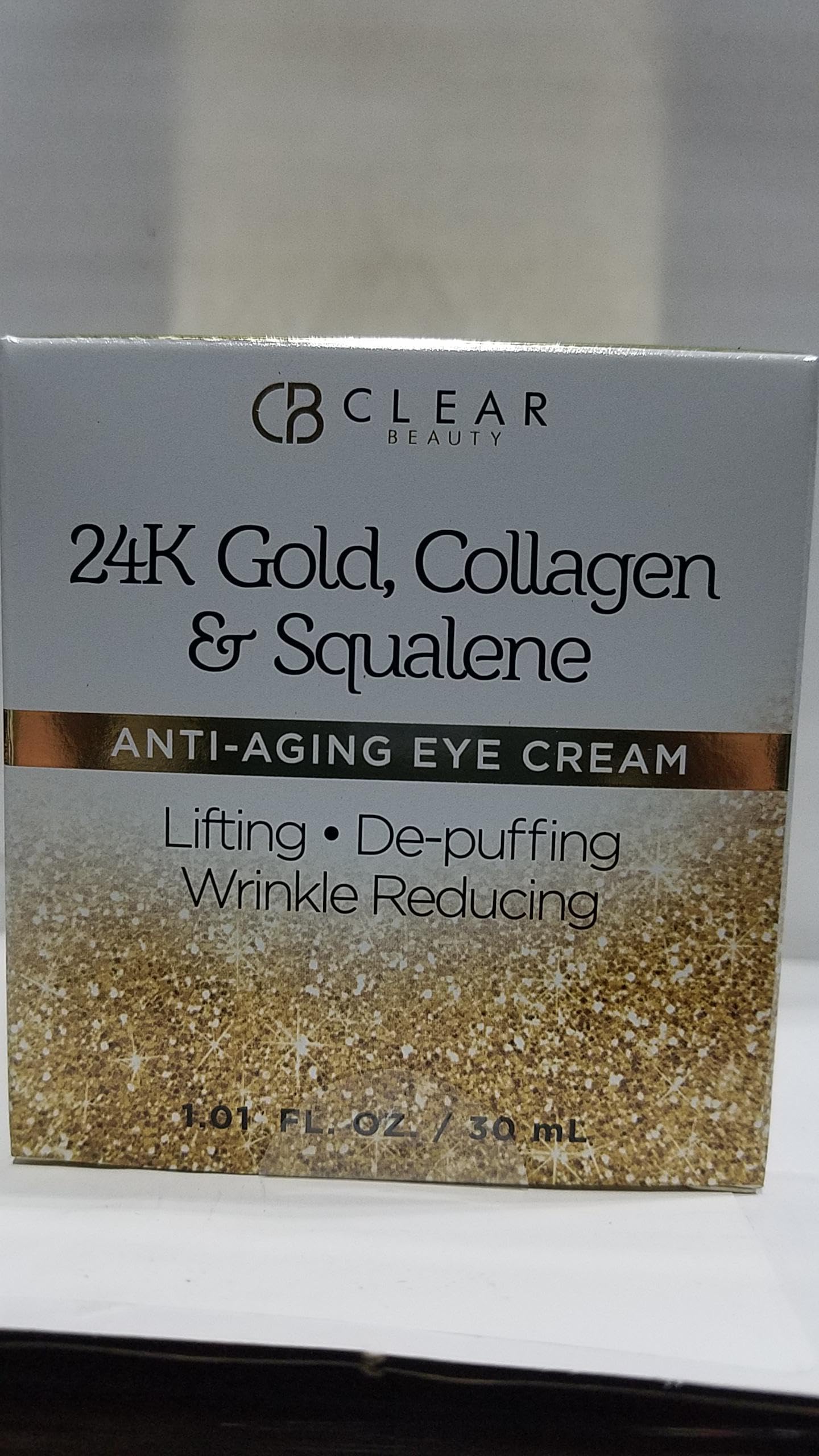Clear Beauty model gently applying eye cream demonstrating easy layering