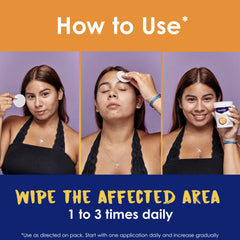 Clearasil pad in hand applying to cheek for fast acne care