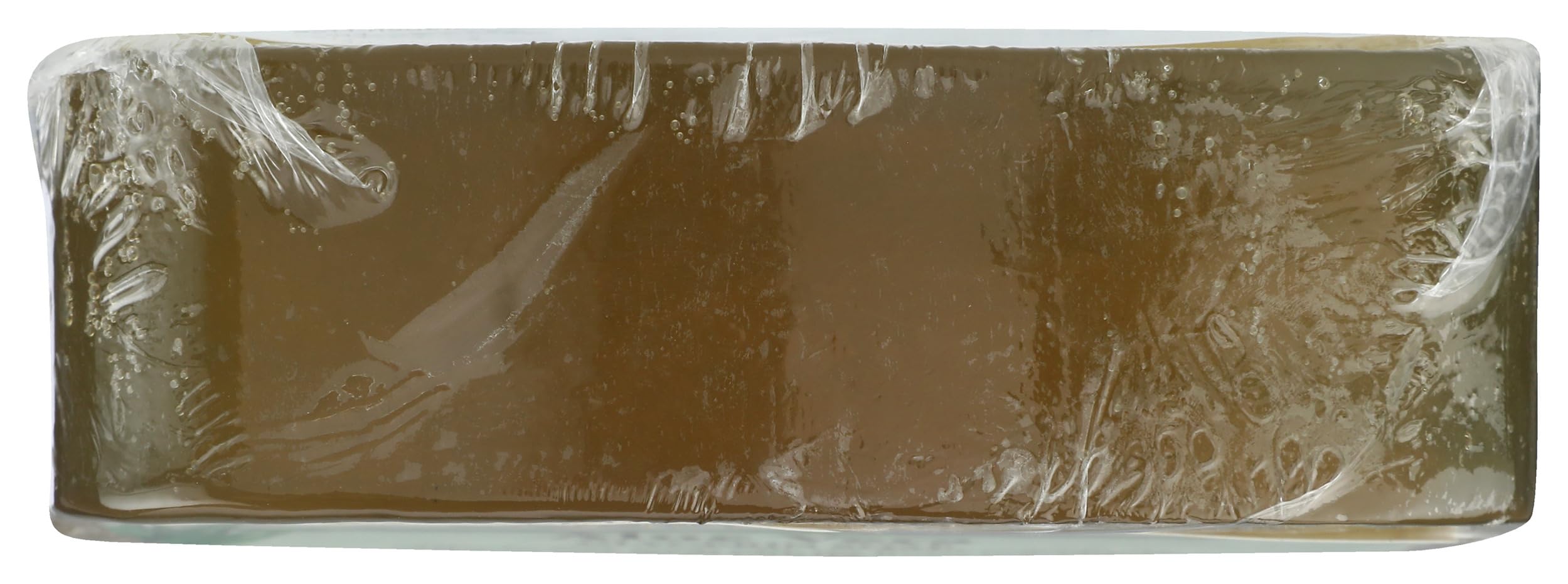 Clearly Natural lathering bar in hand demonstrating gentle cleansing and foam