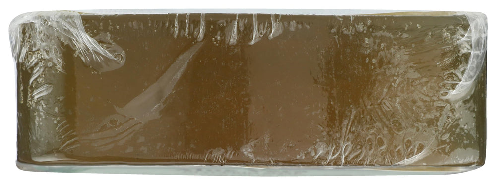 Clearly Natural lathering bar in hand demonstrating gentle cleansing and foam