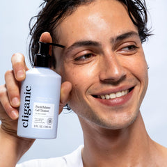 Cliganic recycled-plastic bottle close-up emphasizing sustainable packaging benefit
