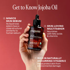 Cliganic jojoba oil applied to hands for soft, hydrated skin