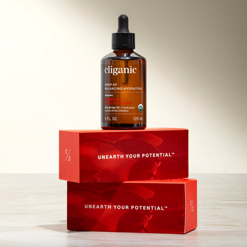 Cliganic jojoba oil on a bathroom shelf in a lifestyle setting showing everyday use benefit