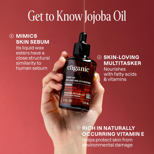 Cliganic jojoba oil pouring from dropper closeup for controlled application