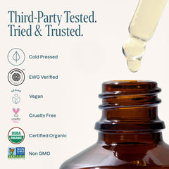 Cliganic oil applied to scalp demonstrating nourishment and conditioning
