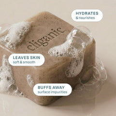 Cliganic close-up of apricot seed particles in soap showing gentle scrub benefit: visible exfoliant texture