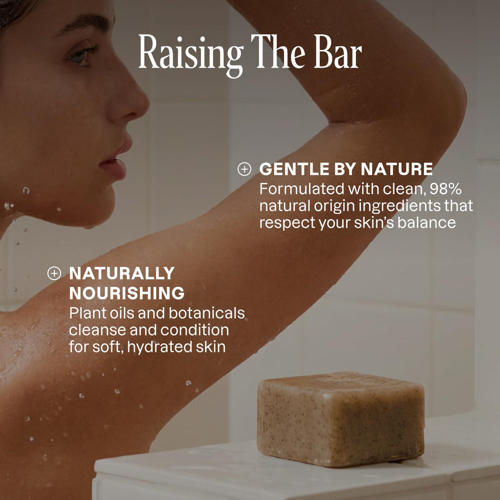 Cliganic soap beside a hand for scale showing actual bar dimensions benefit: size reference