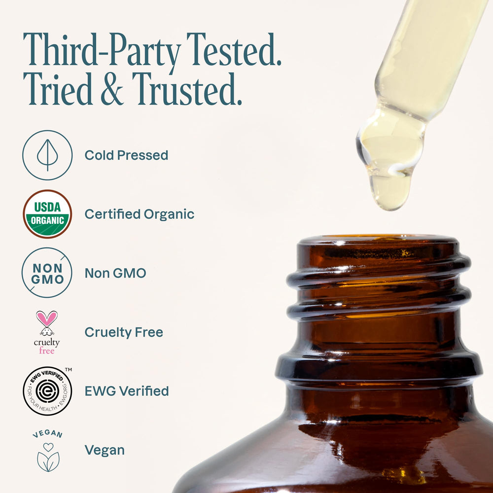 Cliganic tamanu oil being massaged into scalp illustrating even distribution and nourishment