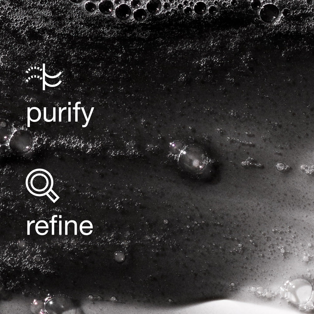 Clinique charcoal label close-up shows ingredient claims and safety-focused benefit