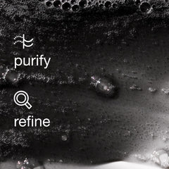 Clinique charcoal label close-up shows ingredient claims and safety-focused benefit