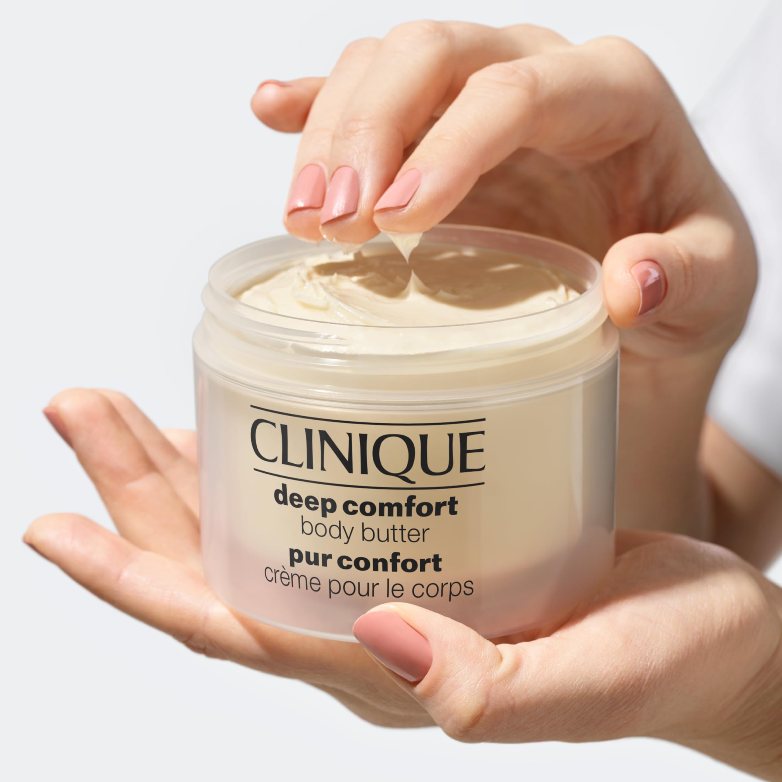 Clinique applied to elbow illustrating smoothing of rough areas benefit