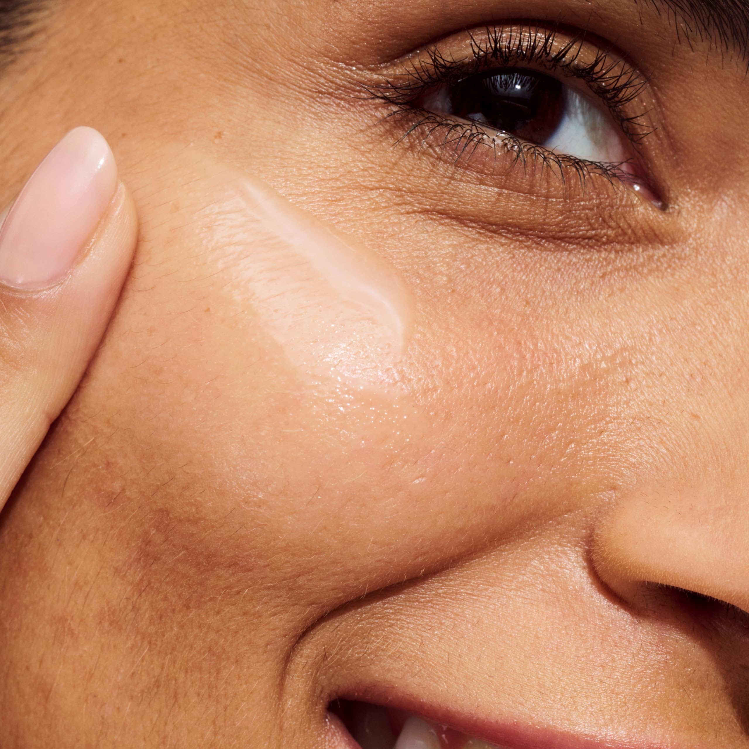 Clinique ingredient display with Vitamin C visual emphasizing brightening support