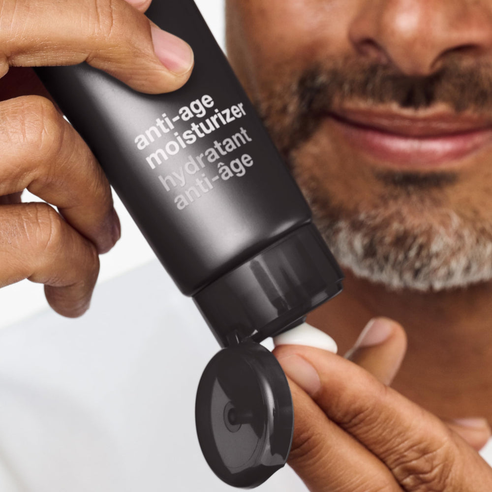 Clinique applying moisturizer to face illustrating hydrating, non-greasy feel