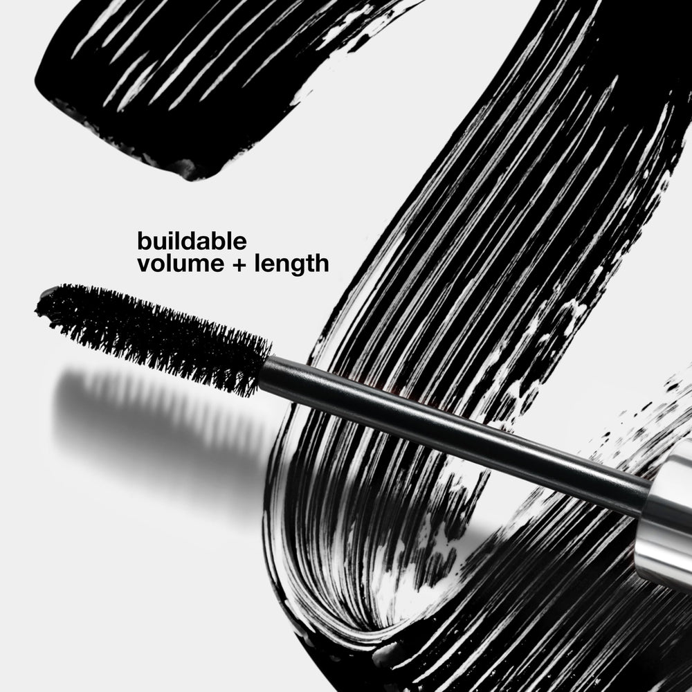 Clinique mini mascara held in hand to show travel-ready scale