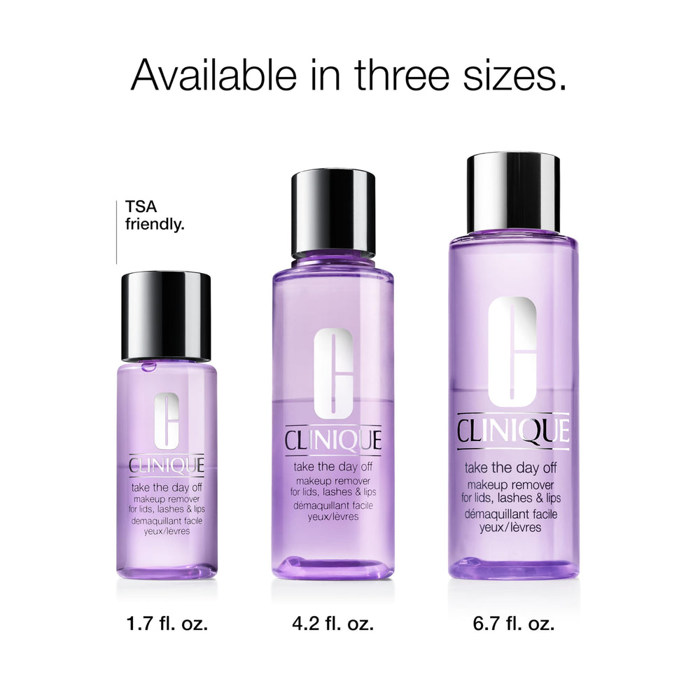 Clinique 1.7 fl oz bottle in hand showing travel-friendly size