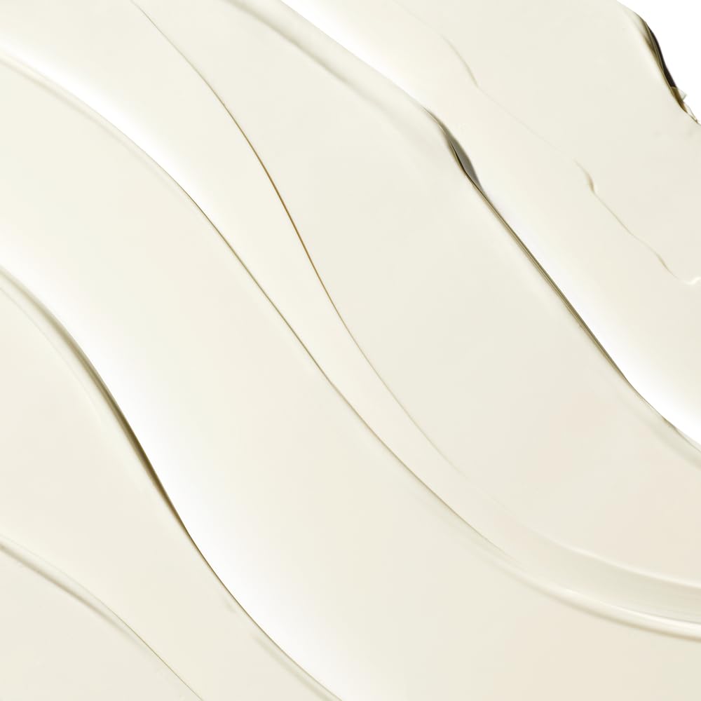 Clinique sunscreen applied to arm illustrating non-greasy coverage and comfort
