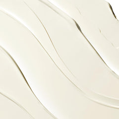 Clinique sunscreen applied to arm illustrating non-greasy coverage and comfort