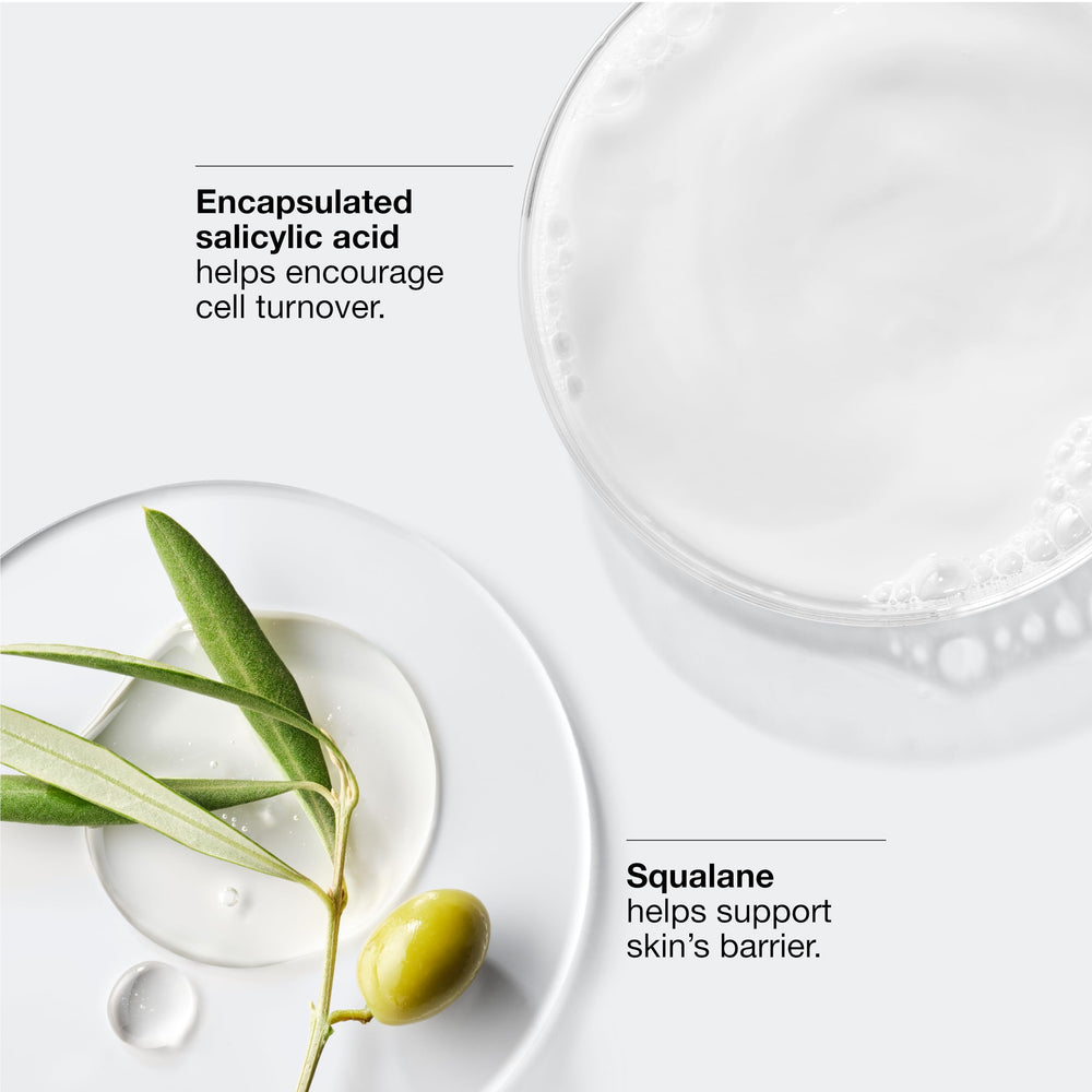 Hand applying Clinique cream to face demonstrating easy absorption and plumping