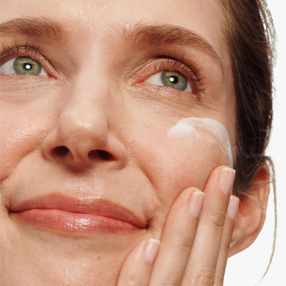 Clinique open jar cream texture close-up highlighting smooth, hydrating finish