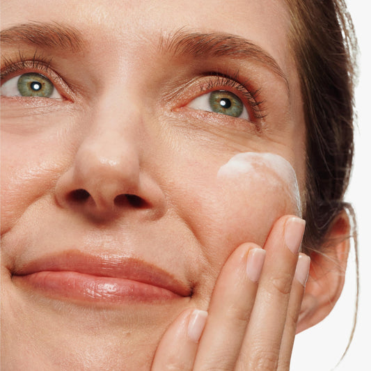 Clinique open jar cream texture close-up highlighting smooth, hydrating finish