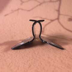 Clip Sugar butterfly clip holding an updo to show stable everyday wear benefit