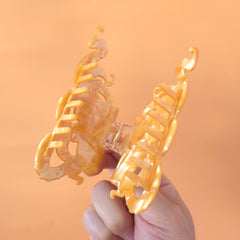 Clip Sugar lifestyle beach setting shows playful look and travel convenience