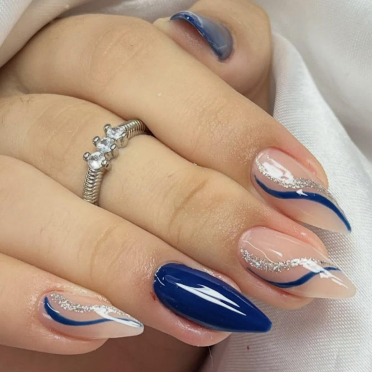 clvpai front packaging showing 24-piece navy blue almond nails and tools for quick application