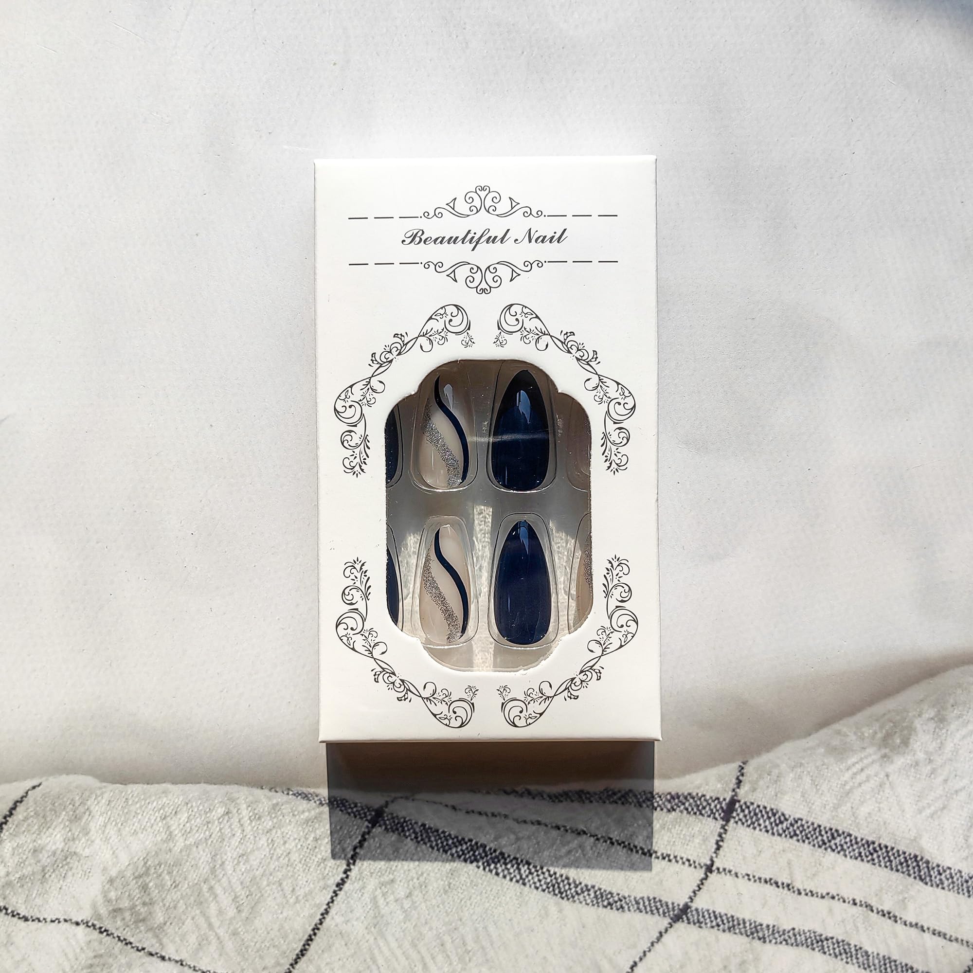 clvpai nails held in hand to show scale and comfortable medium-length size
