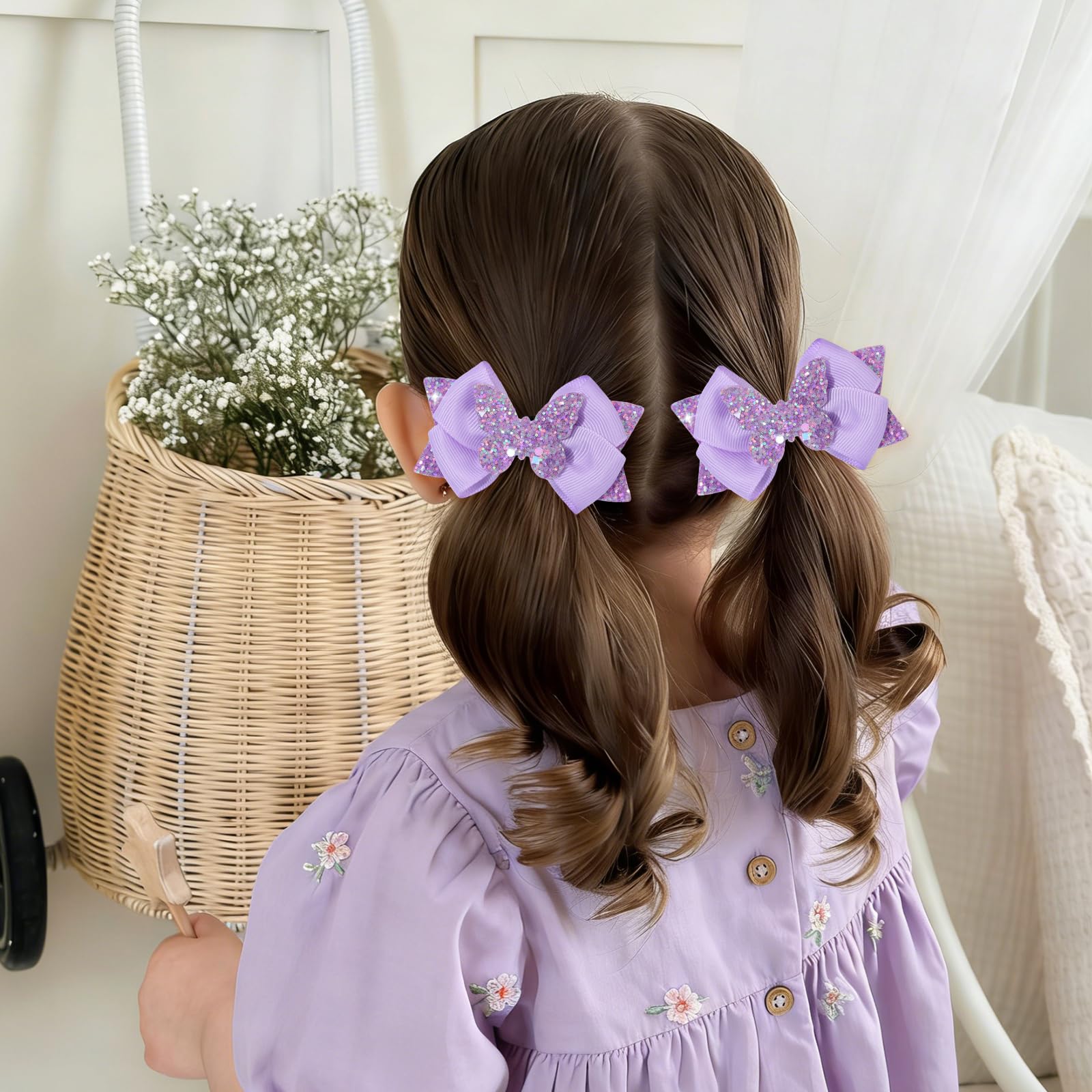 CN hair bow clipped in child's hair demonstrating cute festive look